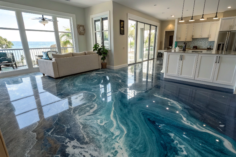 Metallic epoxy flooring with ocean wave pattern in Ipswich living room showing blue and white swirls